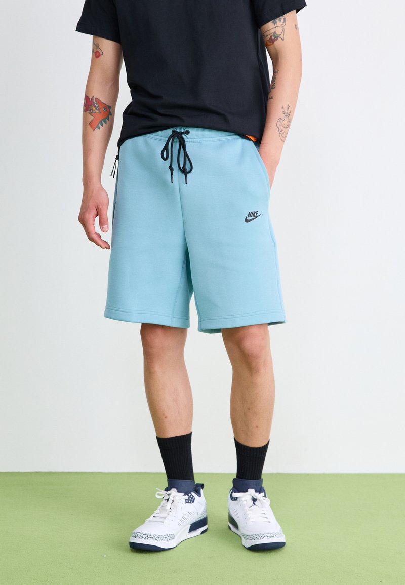 Nike Sportswear SPORTSWEAR TECH FLEECE - Calças de fato de treino - denim turq/black