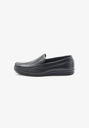 Zwarte leren instappers met stiksel-details, een gladde textuur, een laag profiel en een flexibele rubberen zool voor comfort.
