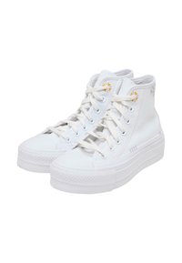 Høye sneakers i hvit strukturert lerret med hvite snører, med en lett plattformsåle og fargerike broderte detaljer på sidene.