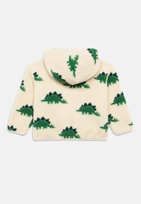 Φλις φούτερ σε εκρού με πράσινο σχέδιο δεινοσαύρου. Διαθέτει κουκούλα και μακριά μανίκια. Μαλακή υφή με cropped σχεδιασμό.