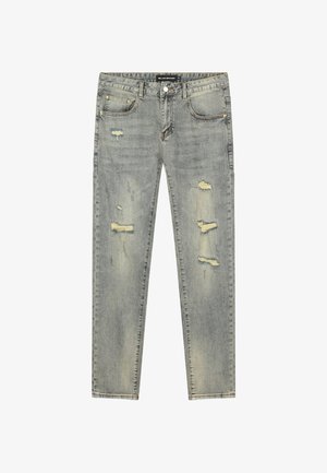 Lichtgrijze skinny jeans met versleten patches op de dijen en knieën, vijf-pocket stijl, met knop- en ritssluiting.