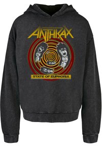 Hoodie noir à manches longues avec un imprimé graphique de visages en spirales rouges et jaunes, avec le texte "ANTHRAX" et "STATE OF EUPHORIA". En mélange de coton.