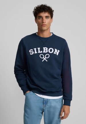 Sudadera de color azul marino hecha de algodón, con letras en blanco "SILBON" y un gráfico de tijeras, cuello redondo y puños acanalados.