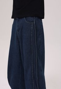 YOURTURN UNISEX - Baggy Jeans - blue wash