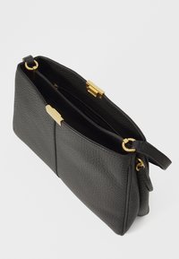 Tommy Hilfiger CASUAL SHOULDER BAG - Sac à main - black