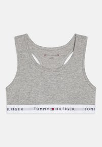 Top corto atlético gris hecho de una mezcla de algodón, con escote redondeado y diseño de espalda racing, con una banda blanca impresa con "TOMMY HILFIGER."