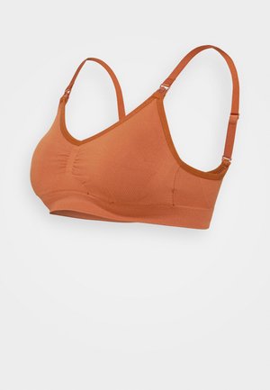 Sutiã em laranja queimado, feito de um material macio e elástico; apresenta alças ajustáveis e um centro franzido para maior suporte.