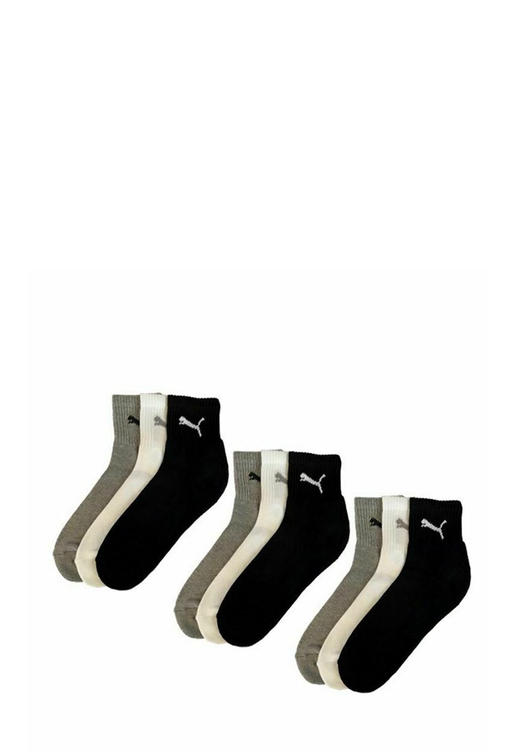 Three sets of ankle-length Puma socks in gray, white, and black, each pair arranged side by side with logo visible on the ankle cuff.