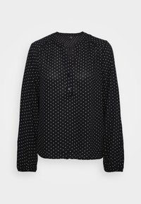 Blusa preta de mangas longas com bolinhas brancas, fecho de botão e decote redondo, com punhos de mangas franzidos. Textura de tecido suave.