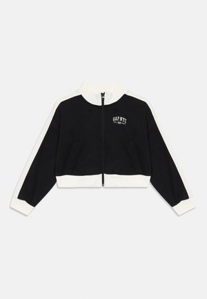 Black zip-up jacket with white accents, high collar, and logo on the chest. Made of soft fabric, featuring two front pockets and ribbed cuffs.