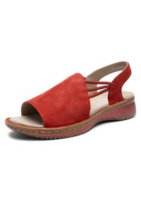 Red suede open-toe sandal with elastic side straps, cushioned insole, and textured sole with low heel.