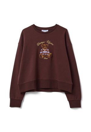 Sweat-shirt marron à manches longues avec un ours en peluche portant une chemise rayée et le texte "Champs-Élysées Paris" brodé sur le devant.
