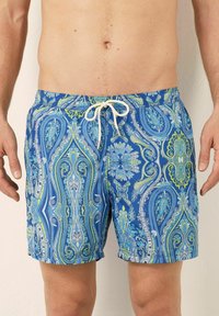 Modré plavky s paisley vzorem v zelených a světle modrých tónech. Mají elastický pas a šňůrku. Lehká tkanina.