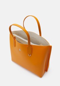 Tommy Hilfiger ICONIC pomarańczowy