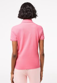 Lacoste Piké - rose