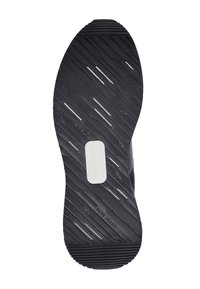 Schwarze Gummisohle mit strukturierten Grip-Mustern, horizontalen und vertikalen Rillen sowie einem weißen Logoakzent in der Mitte.