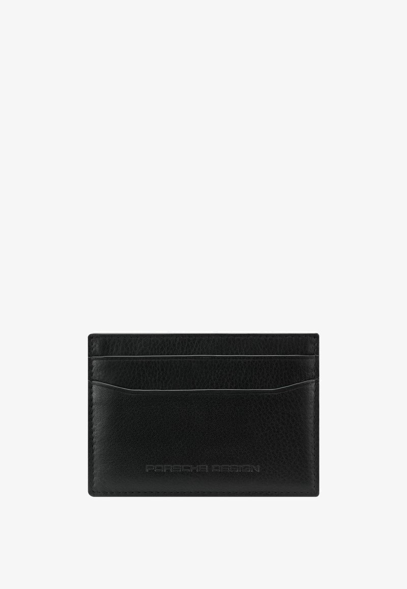 Porte-cartes en cuir noir avec trois emplacements pour cartes et logo "Porsche Design" embossé discret sur le devant.