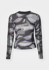 Mesh long-sleeve top in black and gray with a wavy pattern; features a crew neck and three-stripe accents along the sleeves.