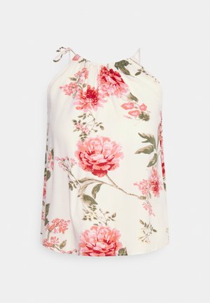 Ærmeløs hvid haltertop med pink og rød blomsterprint og grønne blade, med tynde justerbare skulderstropper.