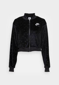 Svart Nike Air zip-up jacka med ribbad krage, manschetter och fåll, med subtila präglade mönster och vit logotyp på vänster bröst.