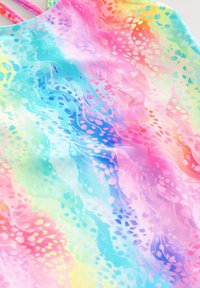 Multicolored fabric with a fluid design featuring pink, blue, and green swirls, and a pattern of faded leaf shapes throughout.