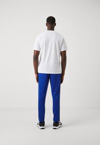 adidas Performance BASE - Trainingsbroek - semi lucid blue