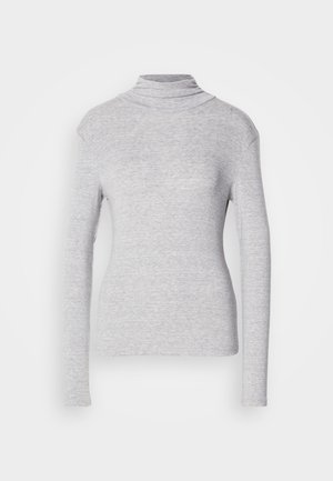 Gray long-sleeve turtleneck top in a soft, textured fabric. Features a fitted design with a high collar and seamless shoulder accents.