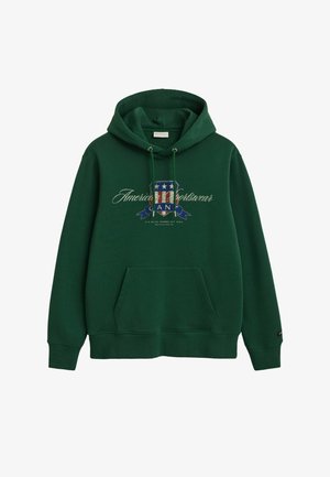 Grüne Kapuzenjacke aus Baumwollmischung, mit einer Fronttasche, Kordelzugkapuze und einem Grafikdesign mit Sternen und Streifen auf der Brust.