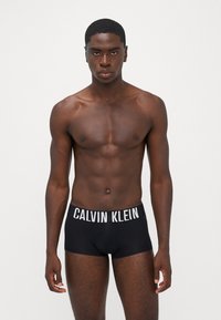 Calvin Klein Underwear LOW RISE TRUNK INTENSE POWER 3 PACK - Ozke boksarice - black/syrah/sand brown