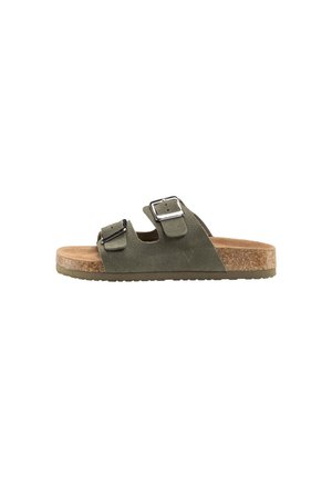 Groene suède slip-on sandaal met twee verstelbare zilveren gespen en kurkachtige zool.