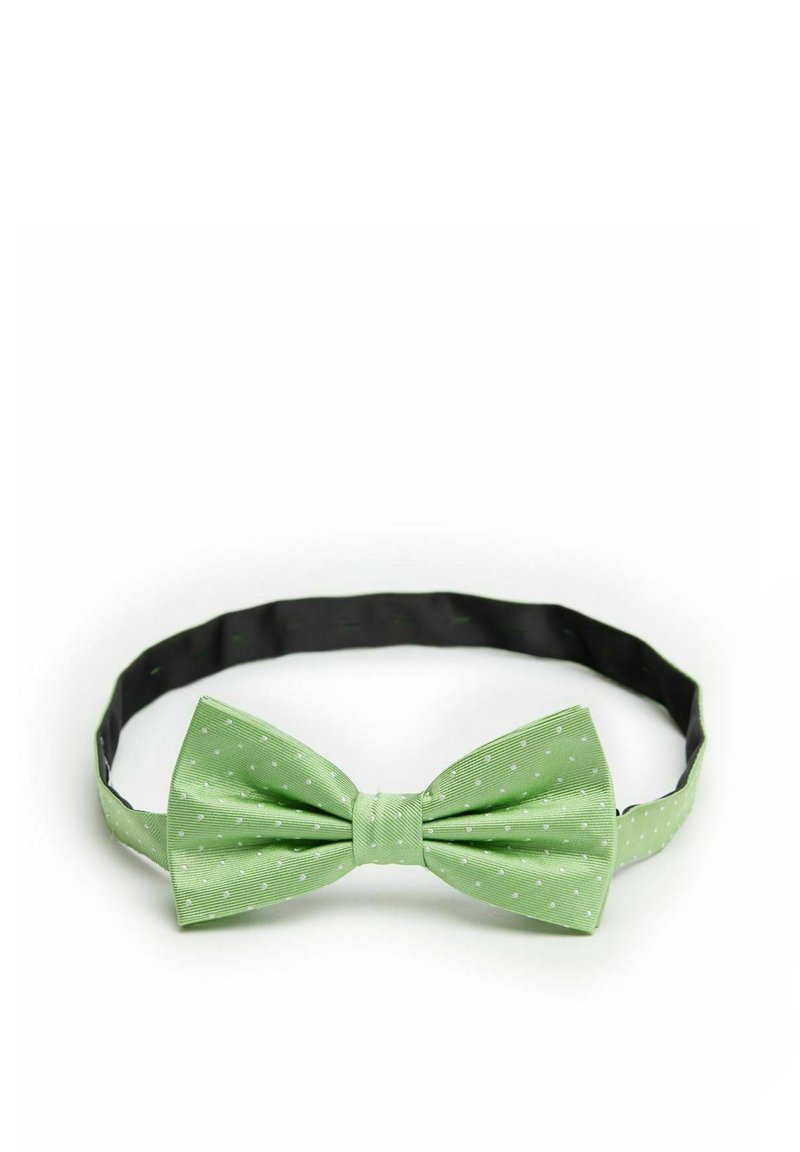 Ljusgrön fluga med vita prickar, tillverkad av texturerad tyg, med ett fast svart justerbart band för anpassning.