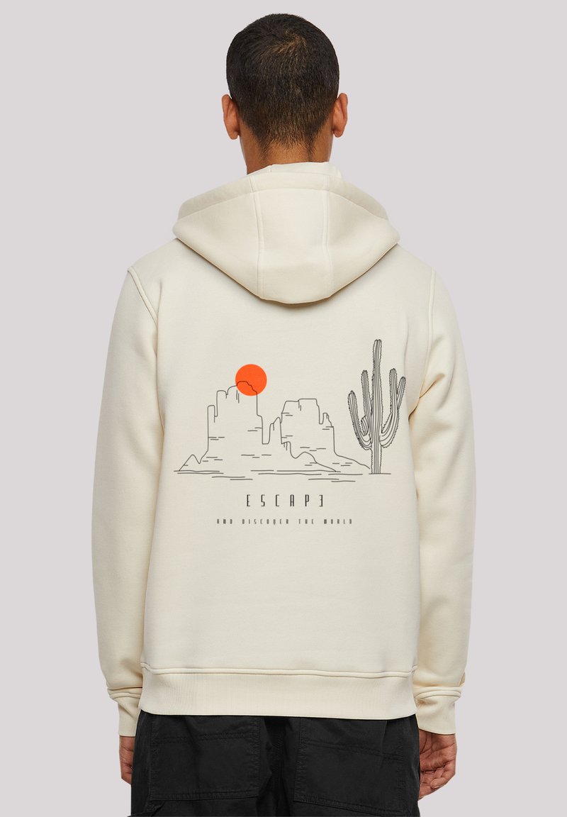 Cream-colored hoodie featuring a graphic design of mountains, a sun, and a cactus on the back. Soft texture, drawstring hood.