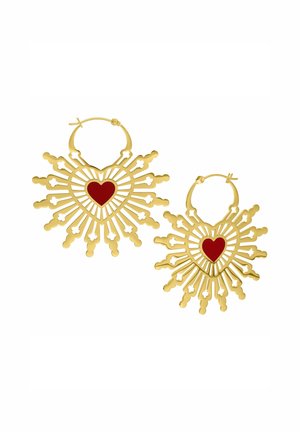 Gold hoop earrings with a sunburst design, featuring a red heart at the center and intricate cut-out patterns. Lightweight metal construction.