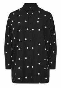 Camicia nera con colletto aperto, maniche lunghe e ricami di margherite bianche su tutta la superficie. Inclusa una tasca sul petto.