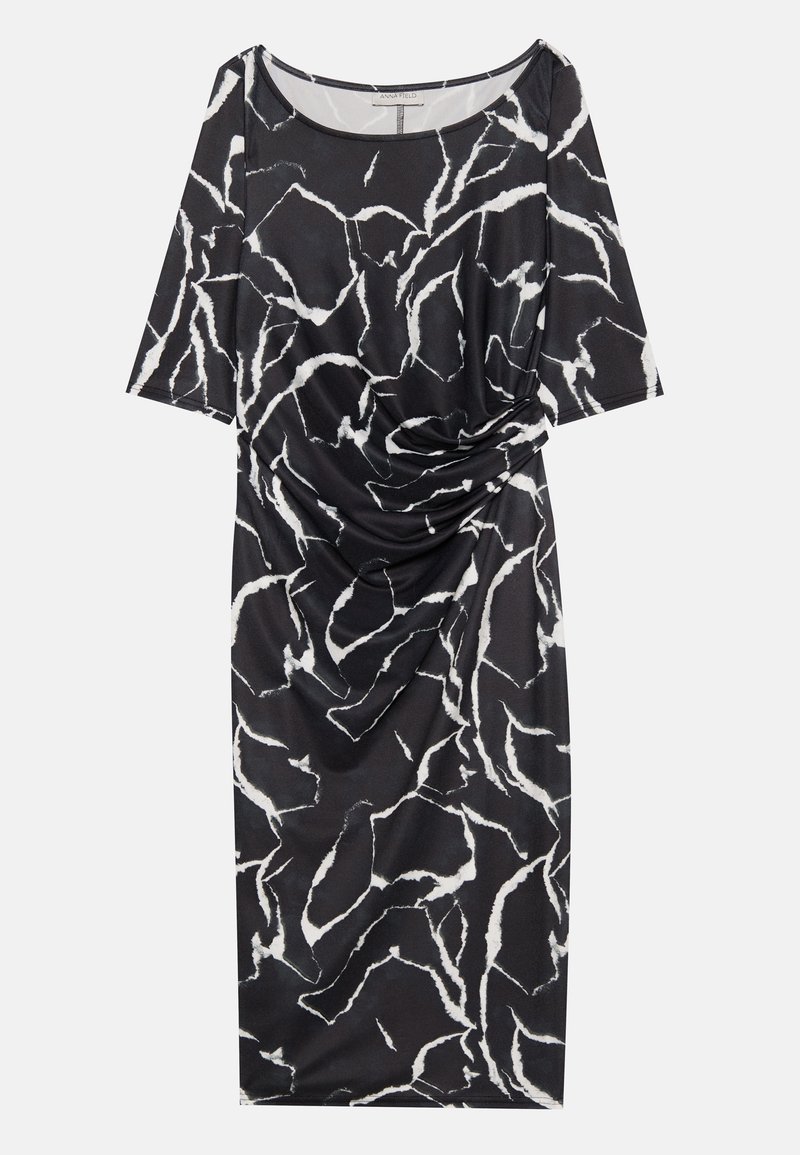 Schwarz-weißer, gemusterter Dress mit kurzen Ärmeln, drapierten Details an der Seite und einer knielangen Silhouette aus einem glatten Stoff.