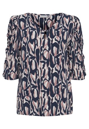 Mitmekesine pluus, millel on tumepruun taust ja abstraktsed roosa ja valge mustrid, lühikesed puffitatud varrukad ja V-kaelus.