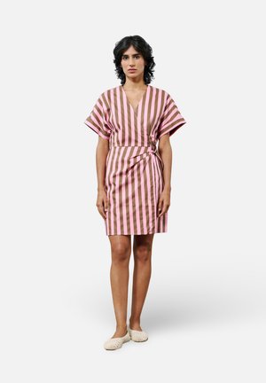 Striped dress in pink and brown fabric, short sleeves, V-neck, belted waist, knee-length, featuring horizontal and vertical stripes.