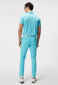J.LINDEBERG Sports DARIO REGULAR FIT  - Polo shirt - bias bridge blue curacao