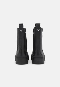 Puma Botines con plataforma - black