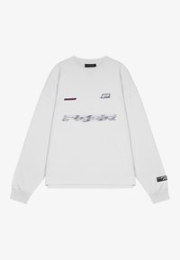 White long-sleeve sweatshirt made of cotton, featuring printed logos in purple and grey, and ribbed cuffs and hem. Simple boxy shape.