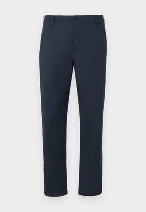 Pantalons en coton bleu marine avec une coupe droite, poches avant, fermeture à bouton et passants de ceinture. Texture lisse sans motifs visibles.