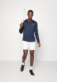 Nike Performance M NKCT DF ADVTG TOP HZ - Pikkade varrukatega topp - obsidian