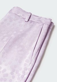 Light purple trousers with a textured fabric featuring subtle, raised dot patterns. Flat front, side pocket, and a straight leg design.