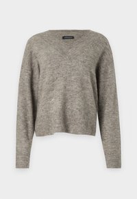 V-hals, langermet genser i lys grå strikket stoff med ribbestrikket kant. Lett tekstur, litt cropped design med avslappet passform.