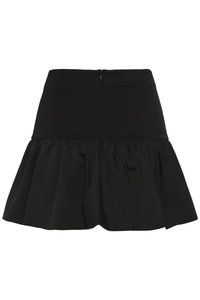 Jupe noire longueur genou avec taille cintrée et ourlet évasé à volants, fermeture zippée centrale au dos.