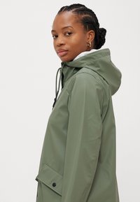 ONLY Petite ONLELISA RAINCOAT - Parka - agave green