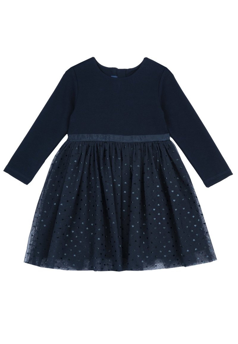 Tmavě modré šaty s dlouhými rukávy, texturovaným živůtkem a vrstvenou tylovou sukní zdobenou malými, rozptýlenými puntíky. Detaily saténového pásku.