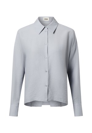 Hellblaues Hemd mit Knopfleiste aus strukturiertem Stoff, mit spitzem Kragen und langen Ärmeln sowie einem leicht geschwungenen Saum.