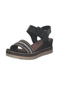 Black wedge sandal with woven gold and white accents. Features a wide strap, adjustable buckle, and textured sole design.