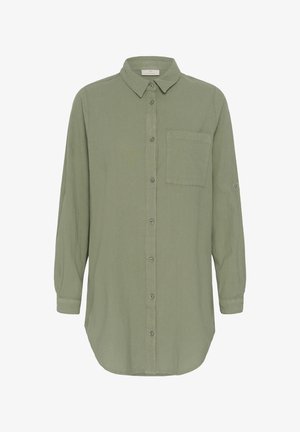 Pikad varrukad, oliivroheline nööbitav särk rinnatasku, krae ja manustatud varrukatega.